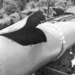 A rip in the penstock that runs from forebay lake to the El Dorado Powerhouse on the South Fork of the American River. About 1940